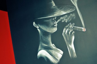 woman in painting having cigar