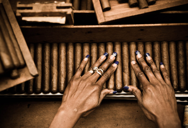 set of cigars and hand